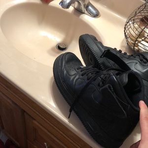 Nike Air Force 1s all black